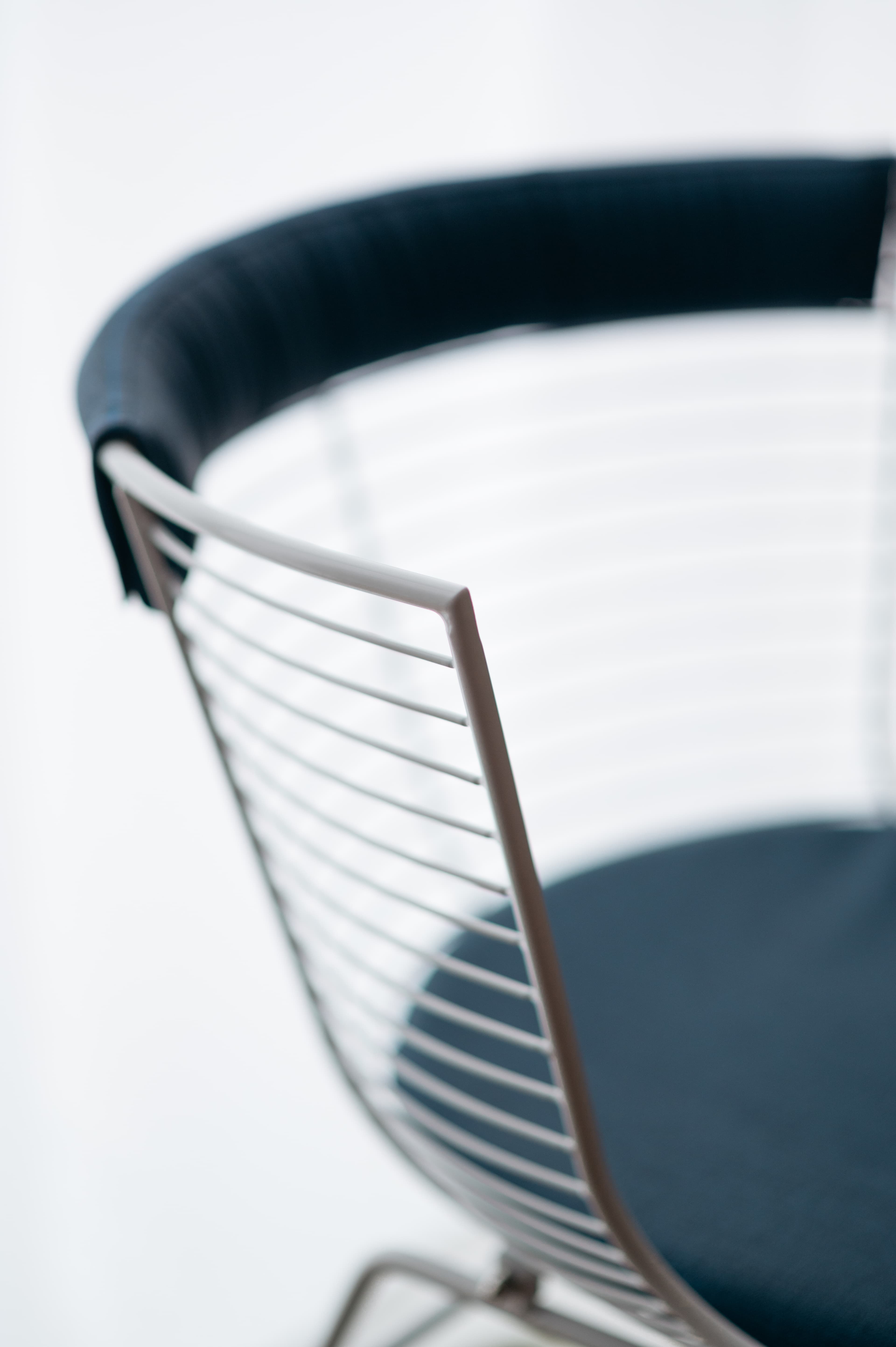 Island Chair metal structure and armrest detail
